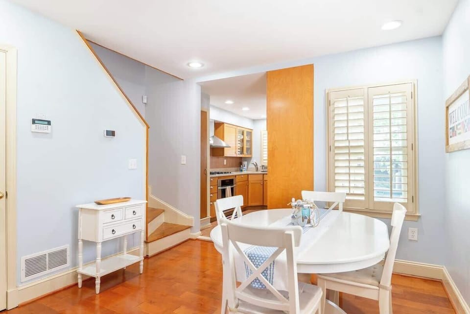 This cozy dining room is a space that invites warmth and togetherness. It is designed to provide a delightful setting for shared meals and cherished moments with friends and family. 
