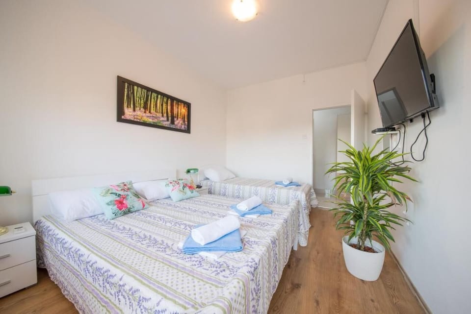 Desk, laptop workspace, free WiFi, bed sheets