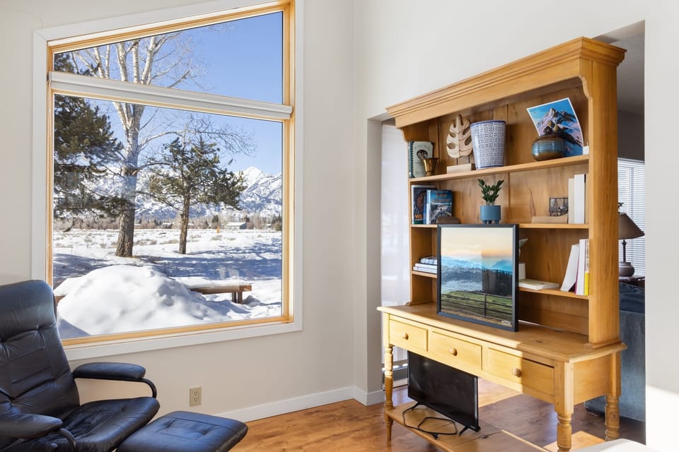 Workspace with Twin bed off living room