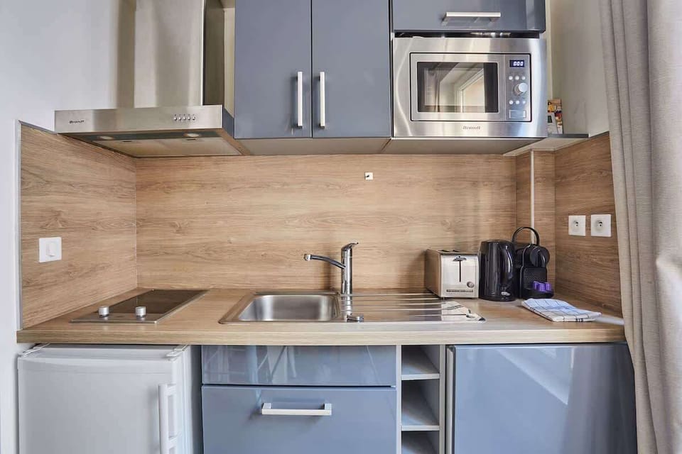 Cuisine équipée avec machine à laver