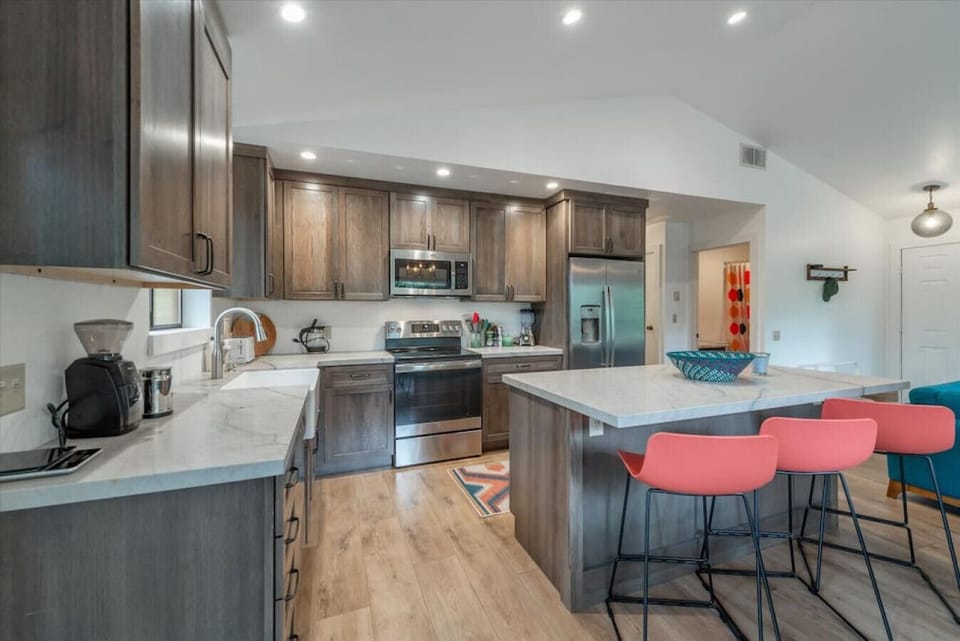 Open Great Room Concept on Main / Upper Floor with Modern Kitchen & Furnishings throughout.