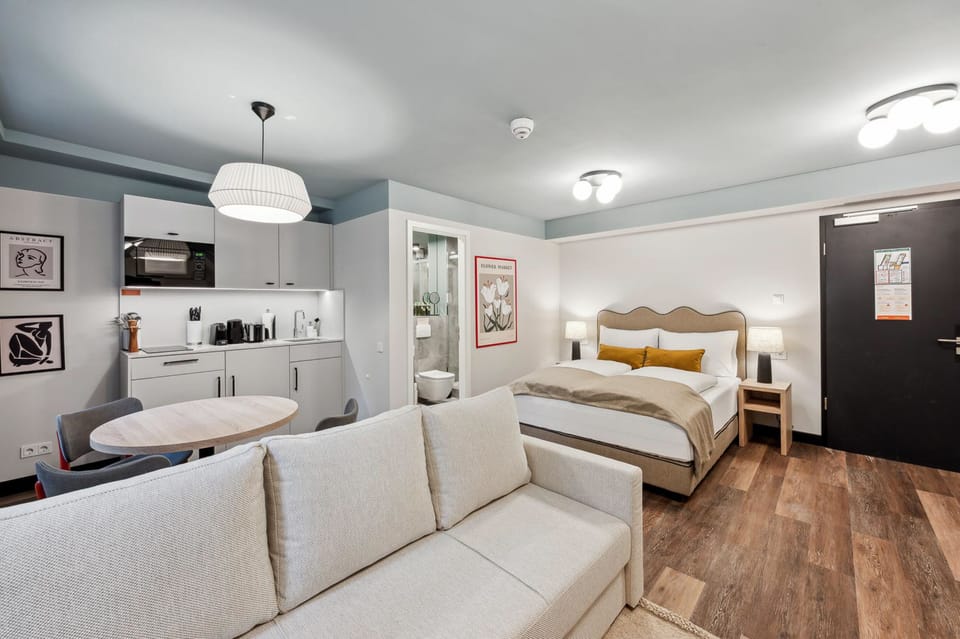 Room with sofa bed (Basement) | Private kitchen