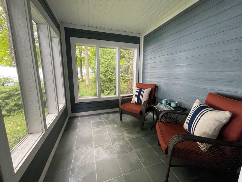 Relax in our cozy sunroom that is connected to the master bedroom/bath!