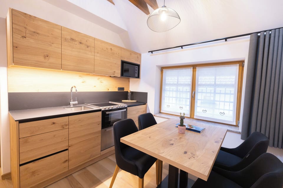 Family Apartment | Living area | 42-inch Smart TV with cable channels, heated floors