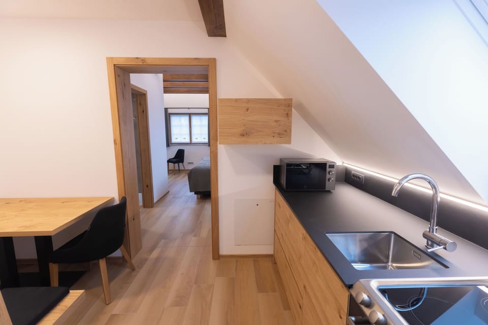 Superior Apartment | Living area | 42-inch Smart TV with cable channels, heated floors