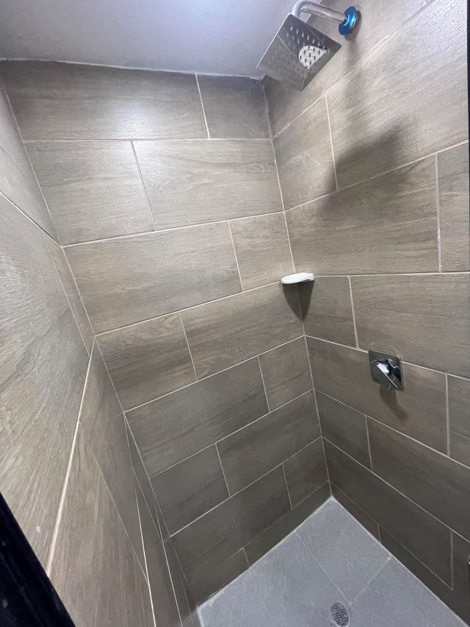 Shower, rainfall showerhead, towels