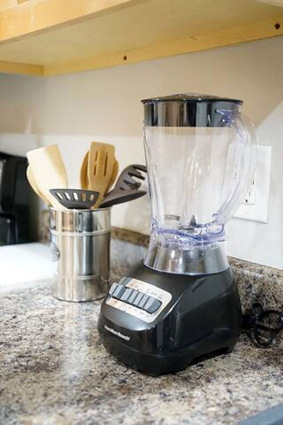 Well-equipped kitchen with blender and essentials for easy meal prep