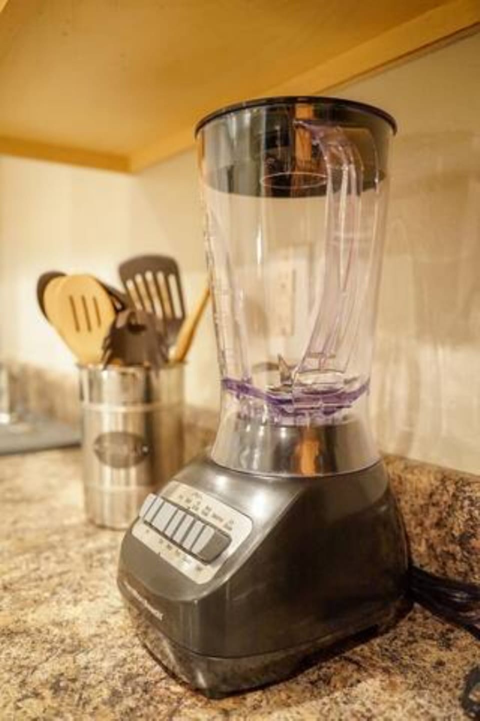 Well-equipped kitchen with blender and handy cooking essentials