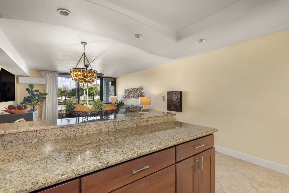 Your open kitchen flows seamlessly into the living space, perfect for cooking while staying connected with your travel companions.
