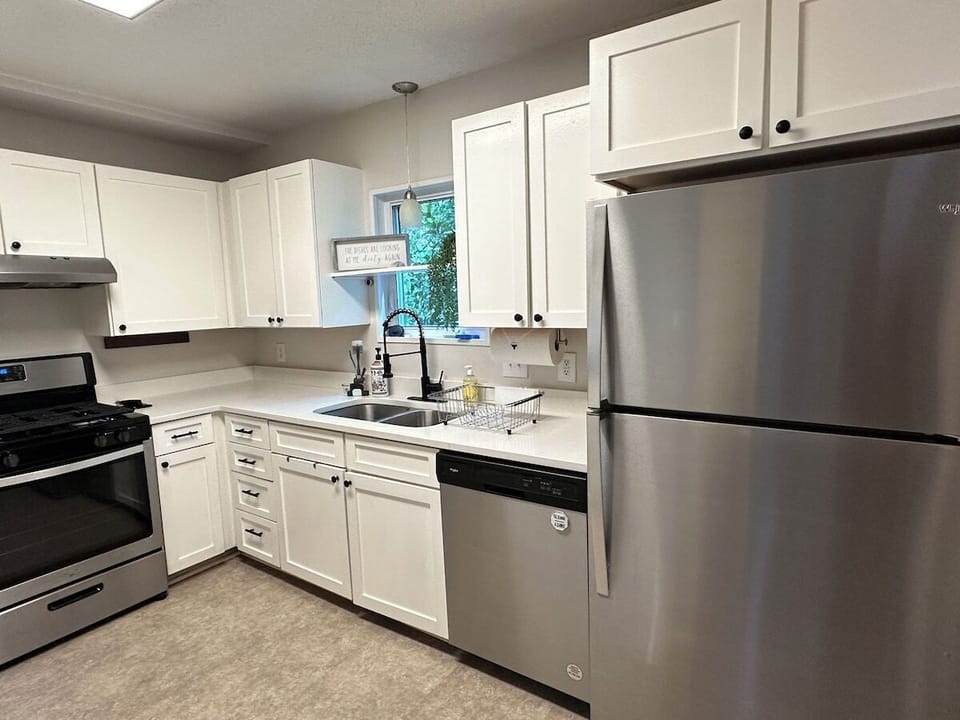 Fully stocked upgraded kitchen with full size dishwasher, stove and fridge. 