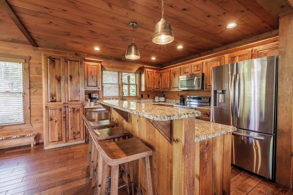 Fully equipped kitchen at Above the Clouds — cook for the whole crew at this spacious Blue Ridge, GA cabin rental in the North Georgia mountains.