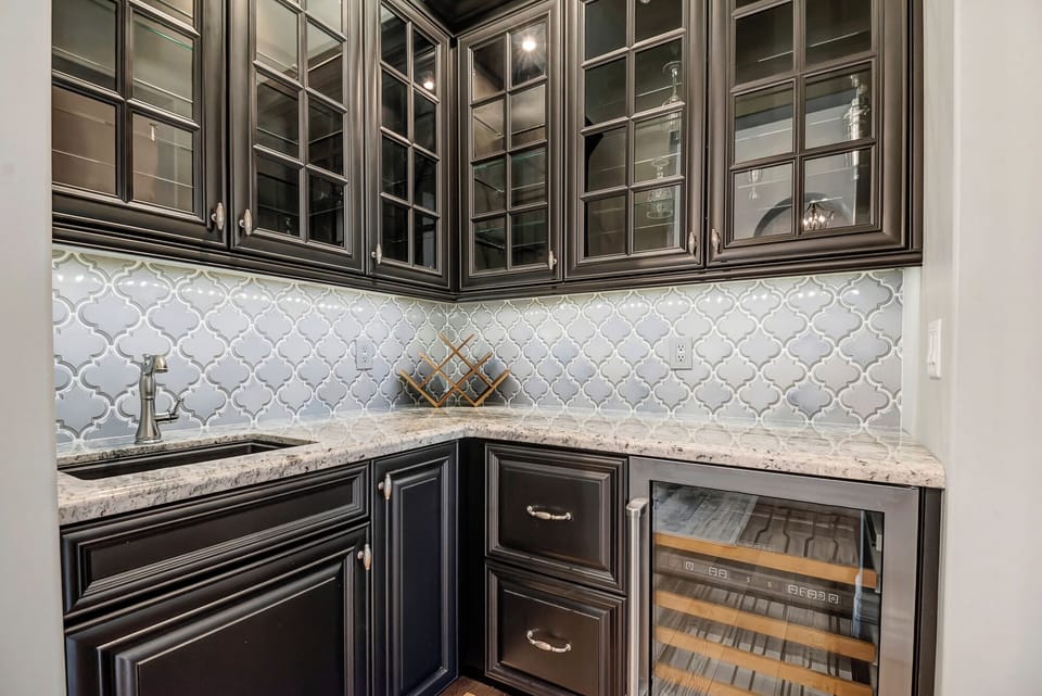 Butler Bar Located off Kitchen with Wine Fridge