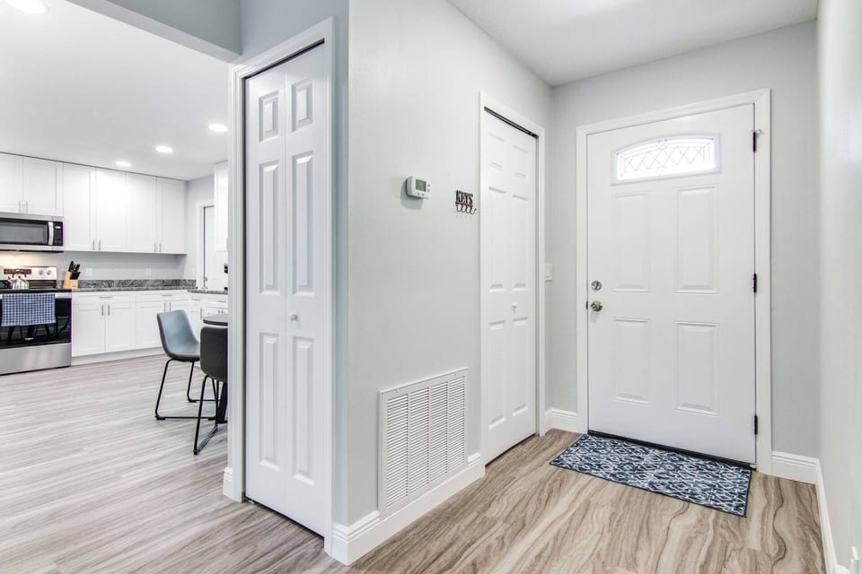 Front door and entry area and open space for the kitchen!