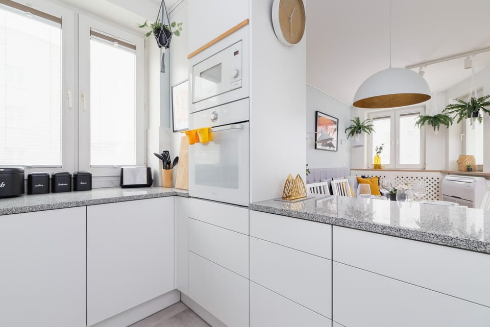 A detailed view of the kitchen, highlighting its clean design and bright atmosphere.

