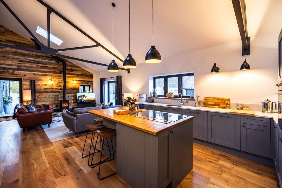 Living Space - the kitchen is fully equipped with Smeg appliances, perfect for aspiring chefs.