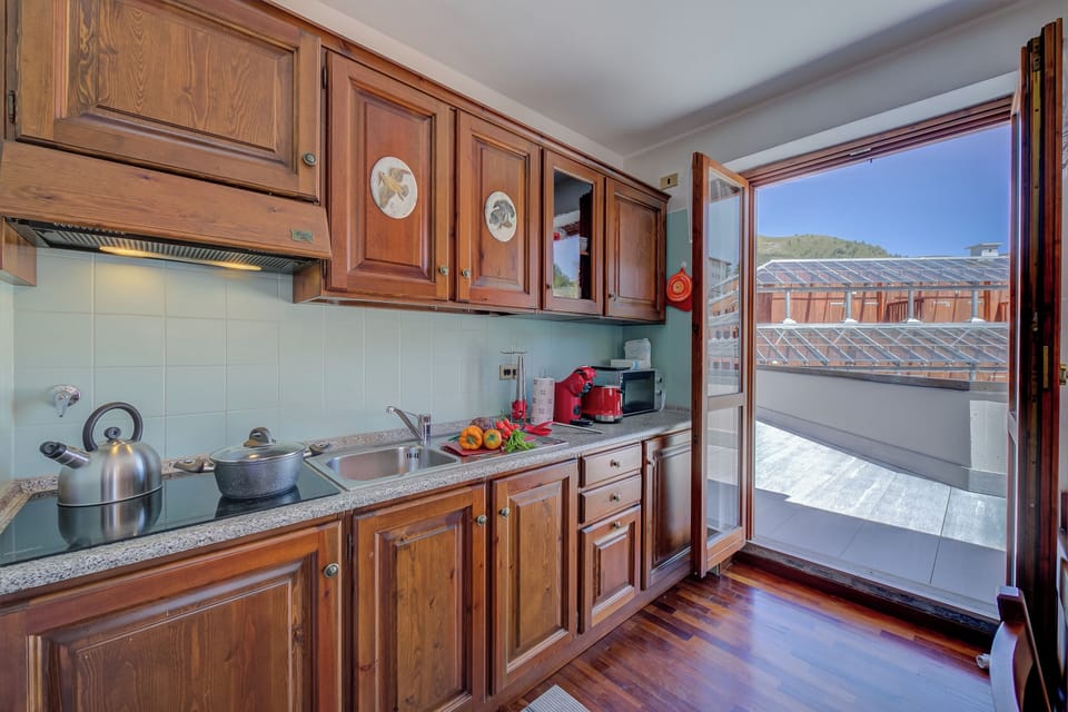 Family Apartment, Multiple Bedrooms (Sestriere Terrace Apt Few Steps From) | Private kitchen | Fridge, microwave, stovetop, dishwasher