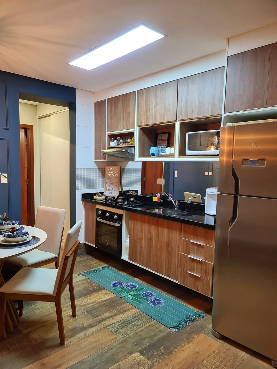 Family Apartment | Private kitchen | Fridge, microwave, toaster, blender