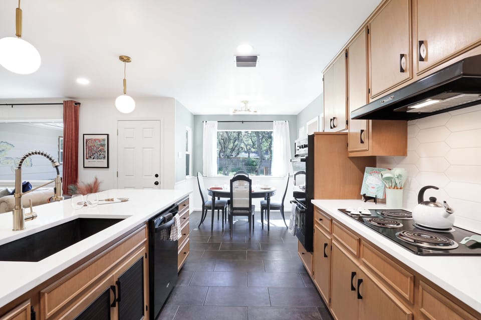 Fully-equipped kitchen.  Quartz counter-tops.  Double oven + stove top. 