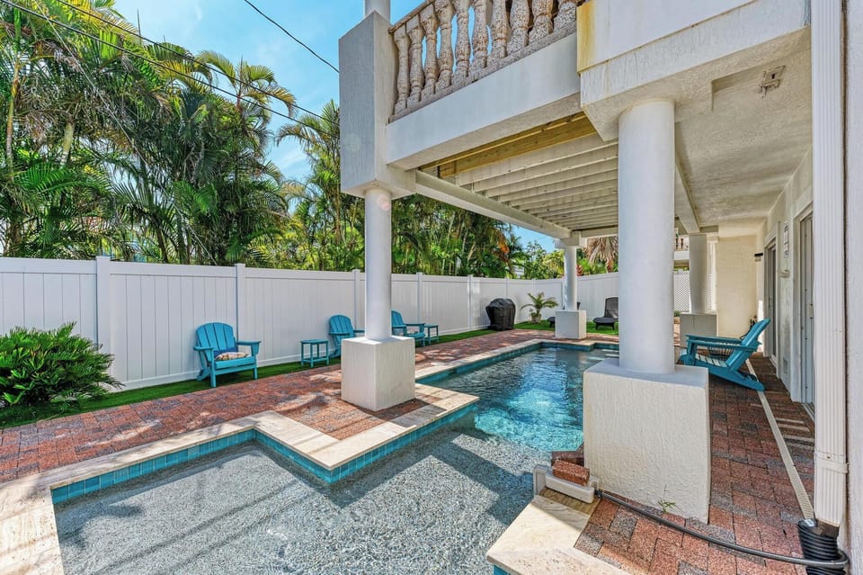 Large heated pool runs under the balcony