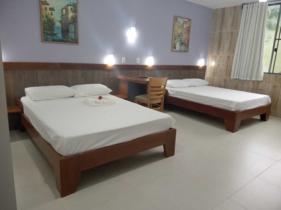 Standard Room | Laptop workspace, bed sheets