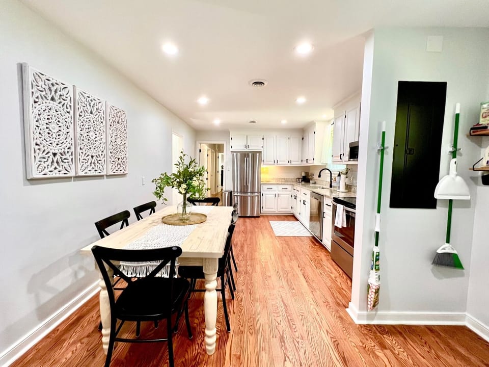 Dining area laundry space and Kitchen from side entrance Enclosed Covered Patio. 