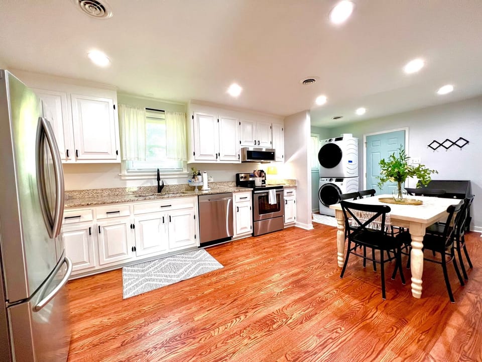 Kitchen and dining area with seating for everyone in one spot. 