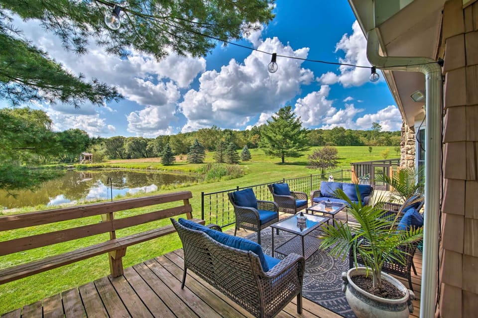 Lounge waterfront on wraparound deck with mountain views and farm landscape
