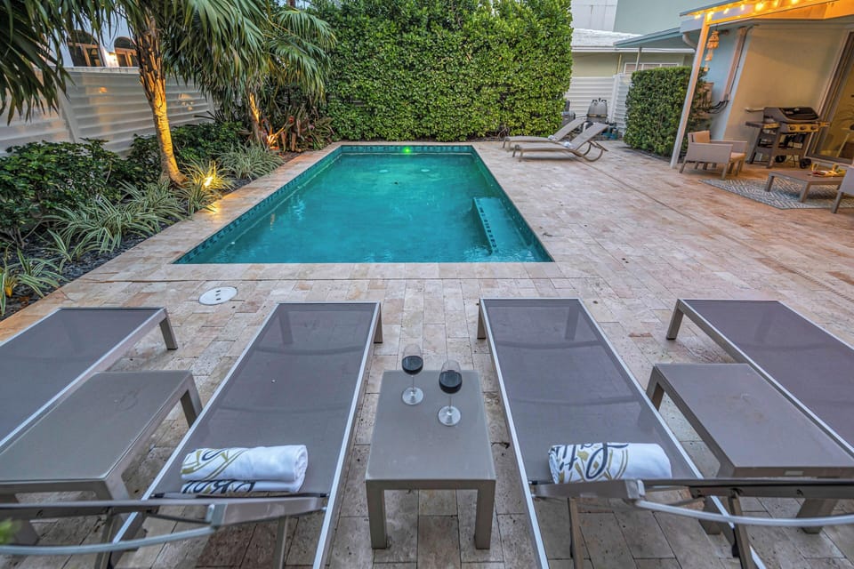 Lounge by the heated pool and take in the night sky.