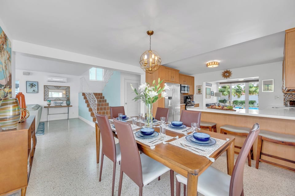 Embrace the joy of gathering and culinary delights in our well-appointed kitchen, offering ample dining space for up to 8 guests.