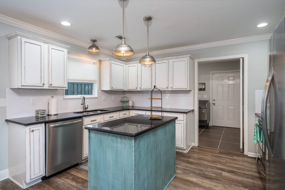 Kitchen Area With the Utility Room in the back