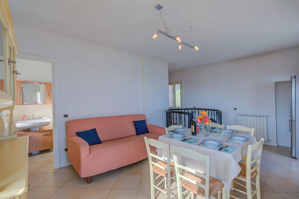 Family Apartment, Multiple Bedrooms, 2 Bathrooms (Palms Villa - Sea View) | Living area | 21-inch flat-screen TV with digital channels