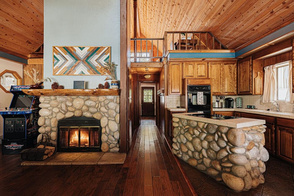 25` ceilings with an open floor plan plus NBA Jam Arcade!