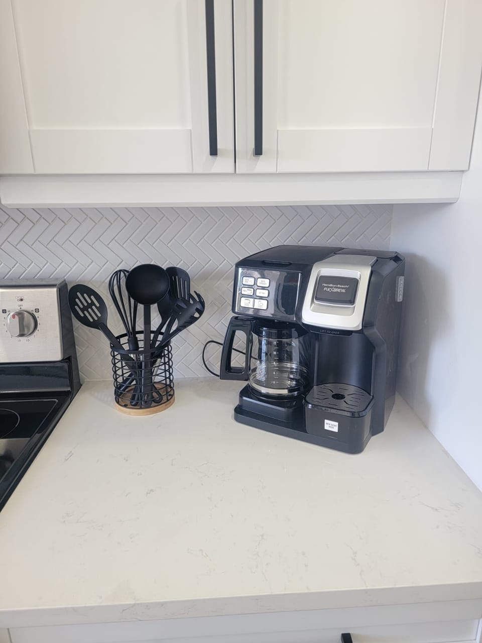 Coffee maker and kitchen essentials ready for your morning routine.