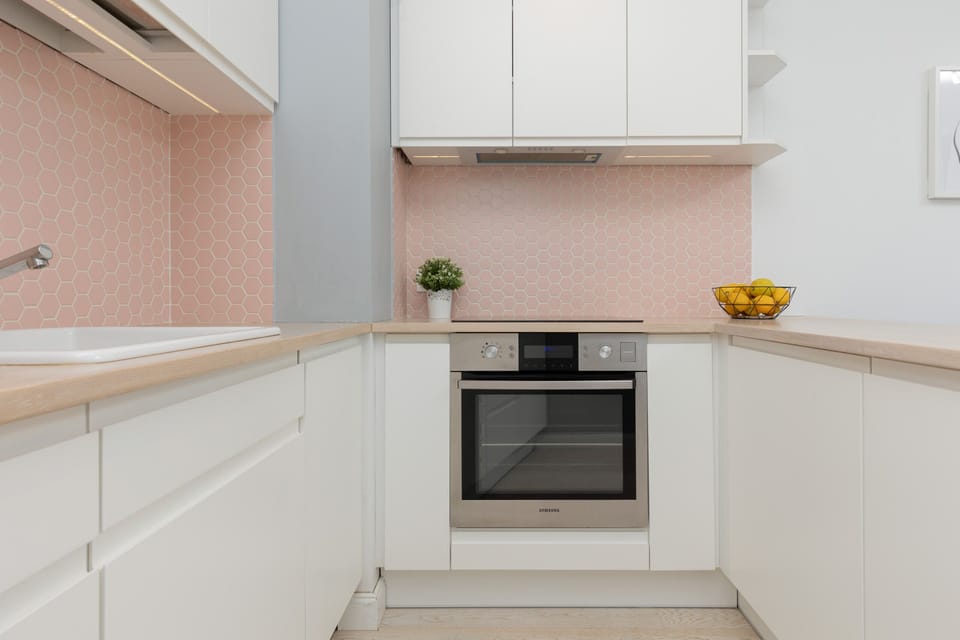 Another angle of the kitchen showcasing its functional layout and cheerful design elements.







