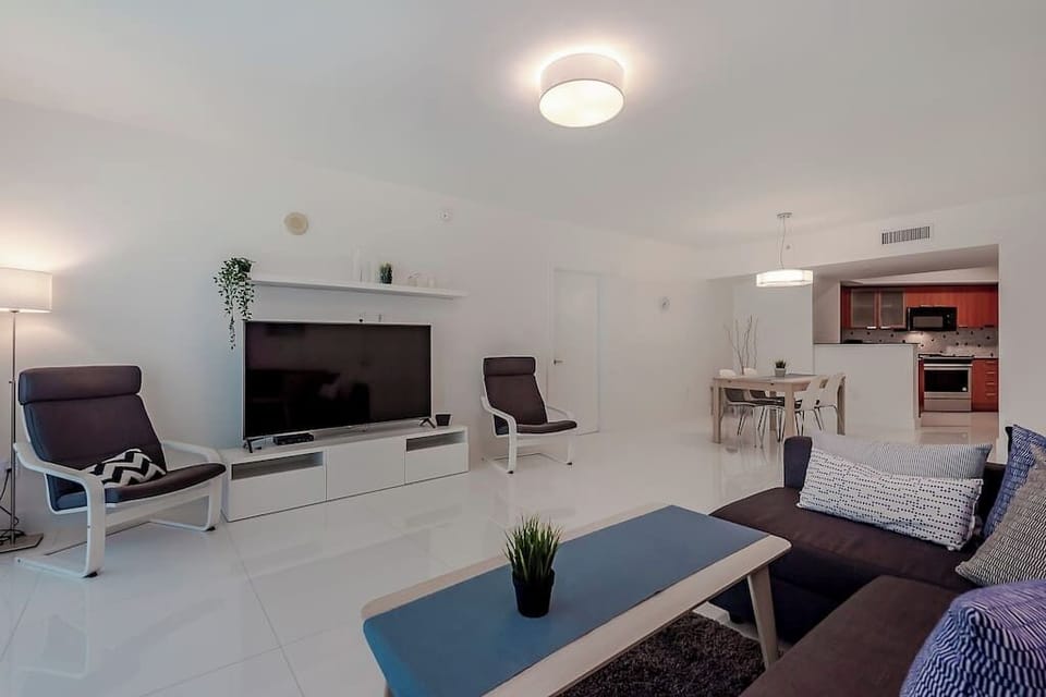 The open layout connects the living room and dining area for effortless entertaining and dining.