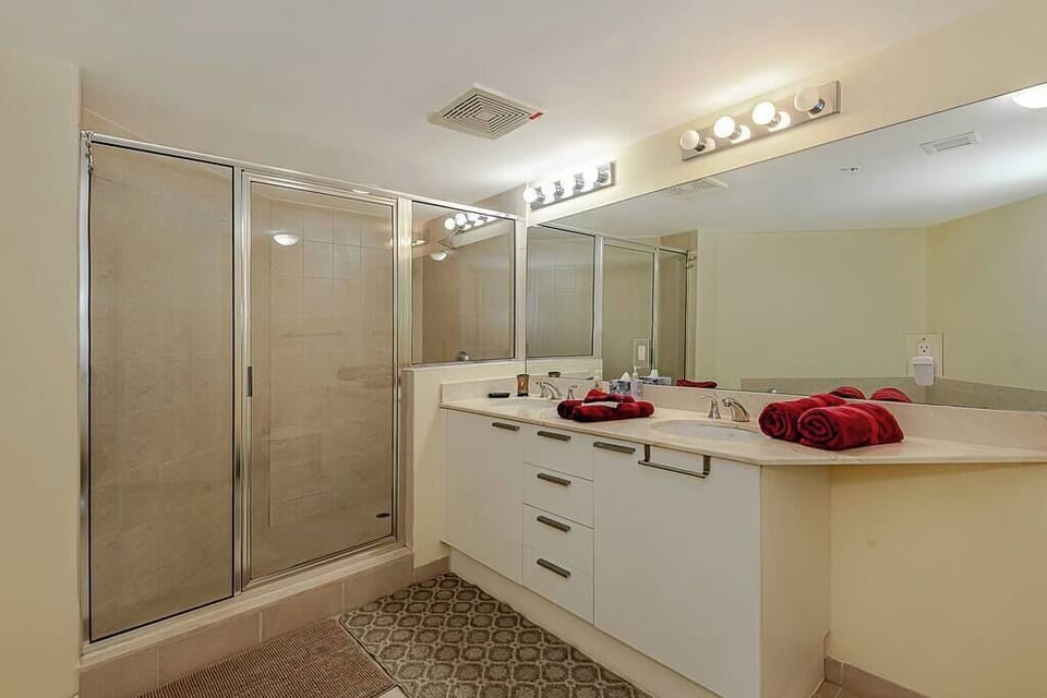 Luxurious master bathroom with elegant fixtures and spacious amenities.