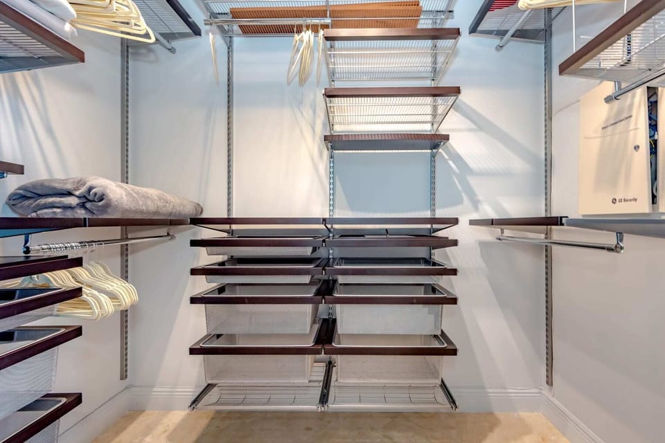 Modern walk-in closet designed for convenient storage and organization of clothing and accessories