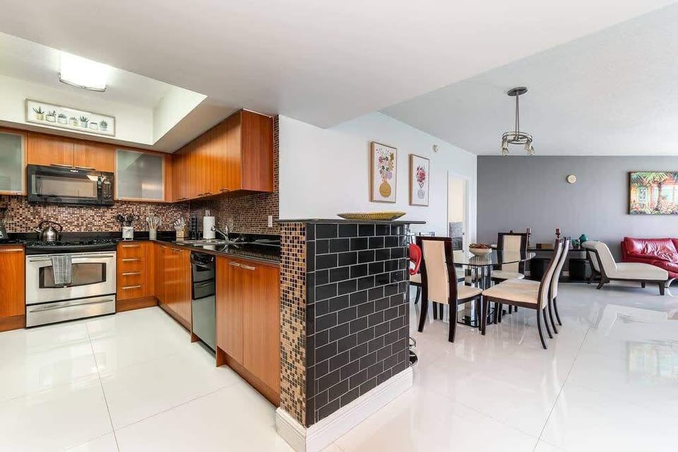 Modern kitchen equipped with state-of-the-art appliances and ample counter space.