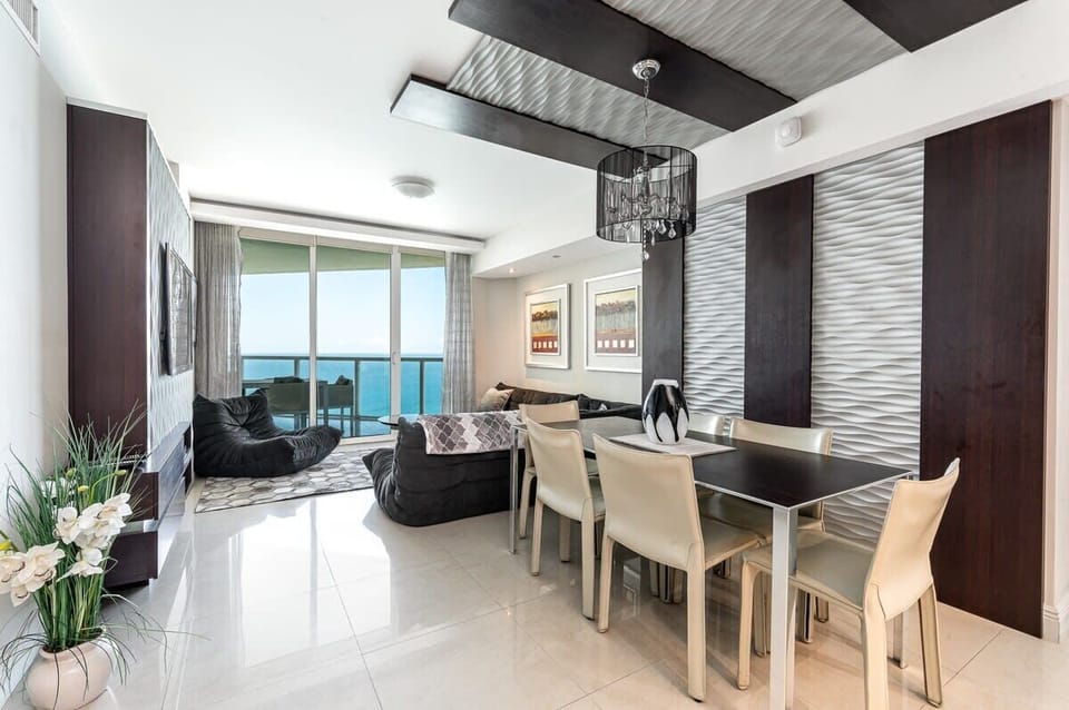 Spacious living room and dining area, perfect for gatherings and meals together.