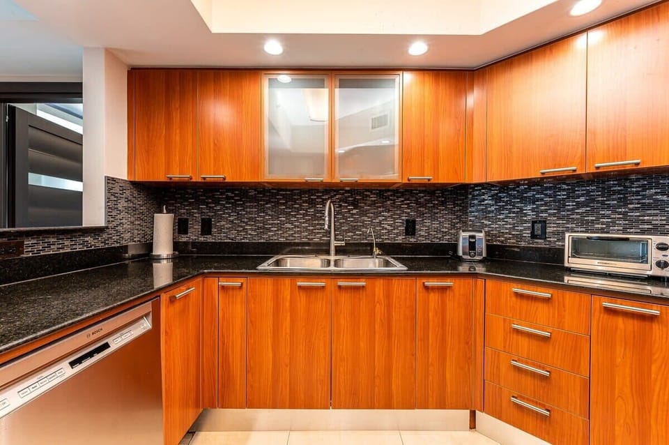 Fully furnished kitchen with modern appliances and abundant counter space