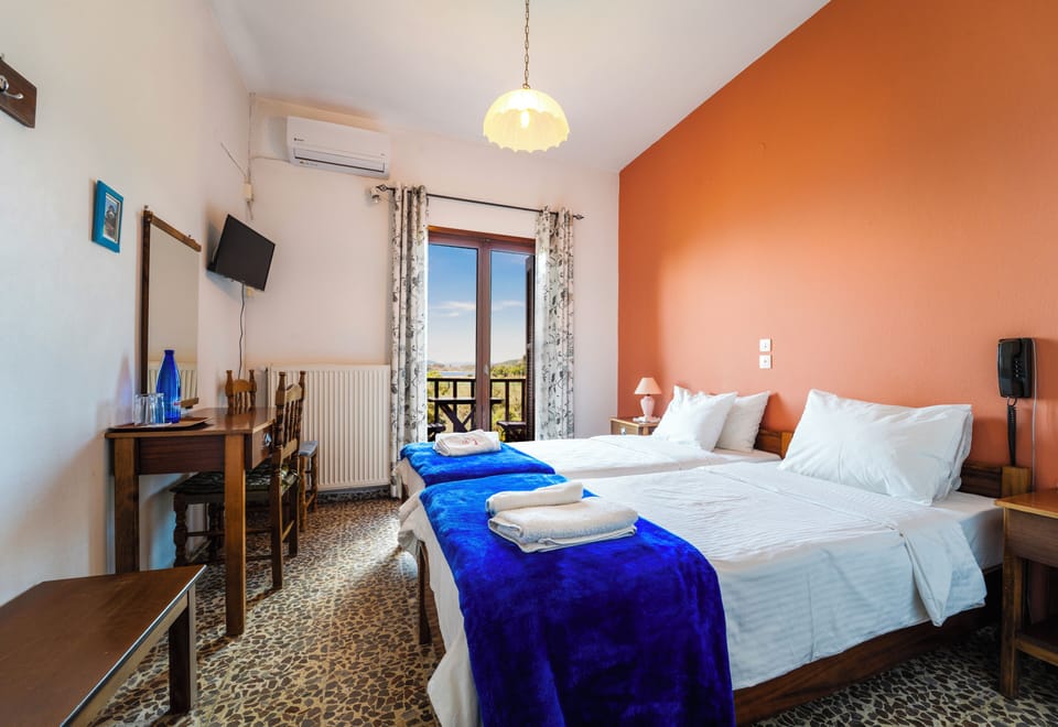 Basic Double or Twin Room, 2 Twin Beds | Individually decorated, free WiFi, bed sheets