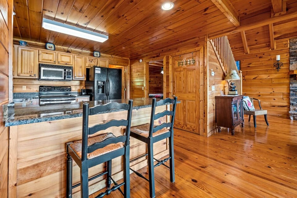 Two additional seats at the bar area.