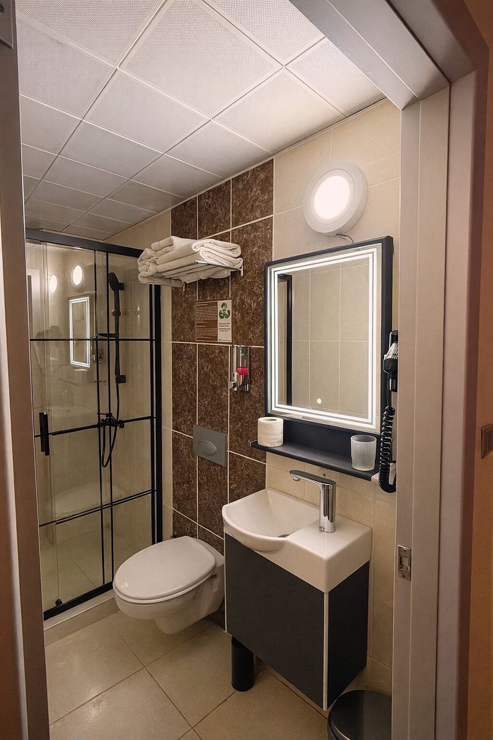 Shower, hair dryer, bathrobes, towels