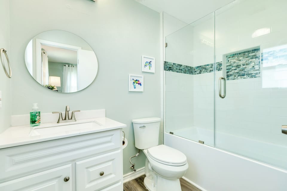 Primary bathroom with tub & shower combo
