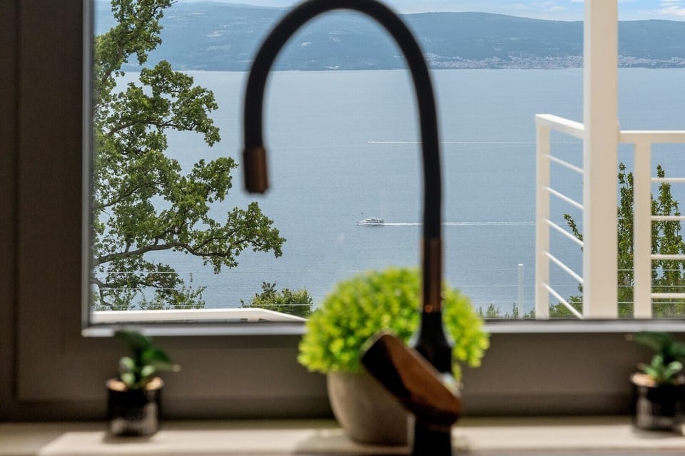 The panoramic sea views from the kitchen area are breathtaking.