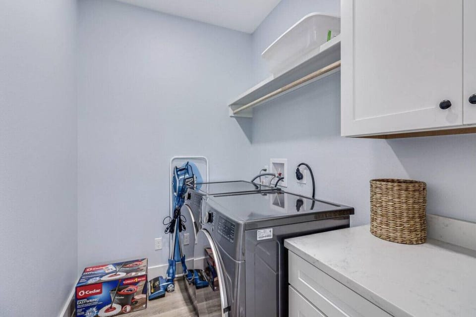 In-home laundry room to keep your beach towels fresh and ready for adventure.