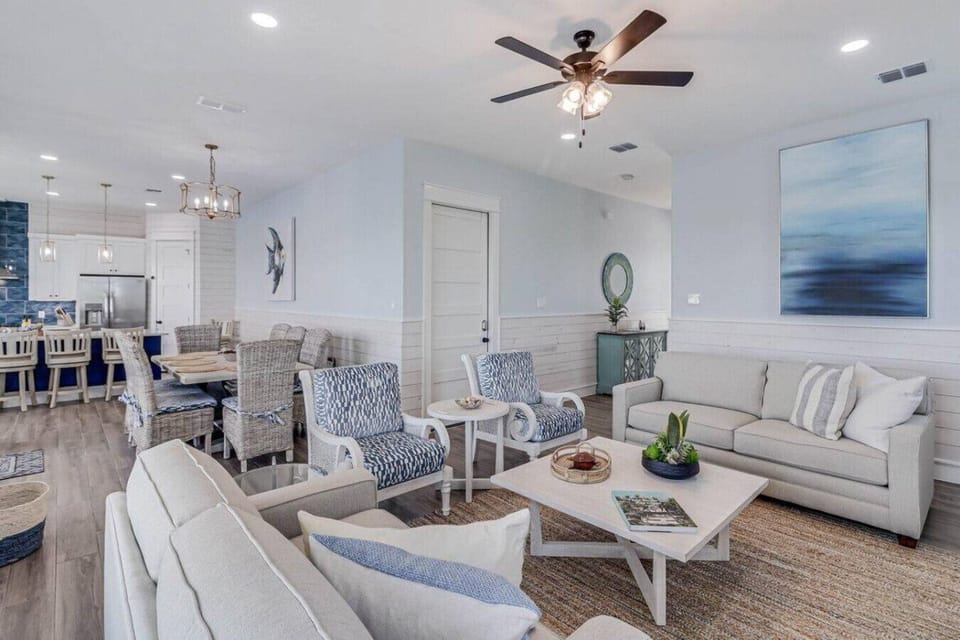 Spacious and airy with seaside-inspired décor – your perfect vacation hub.