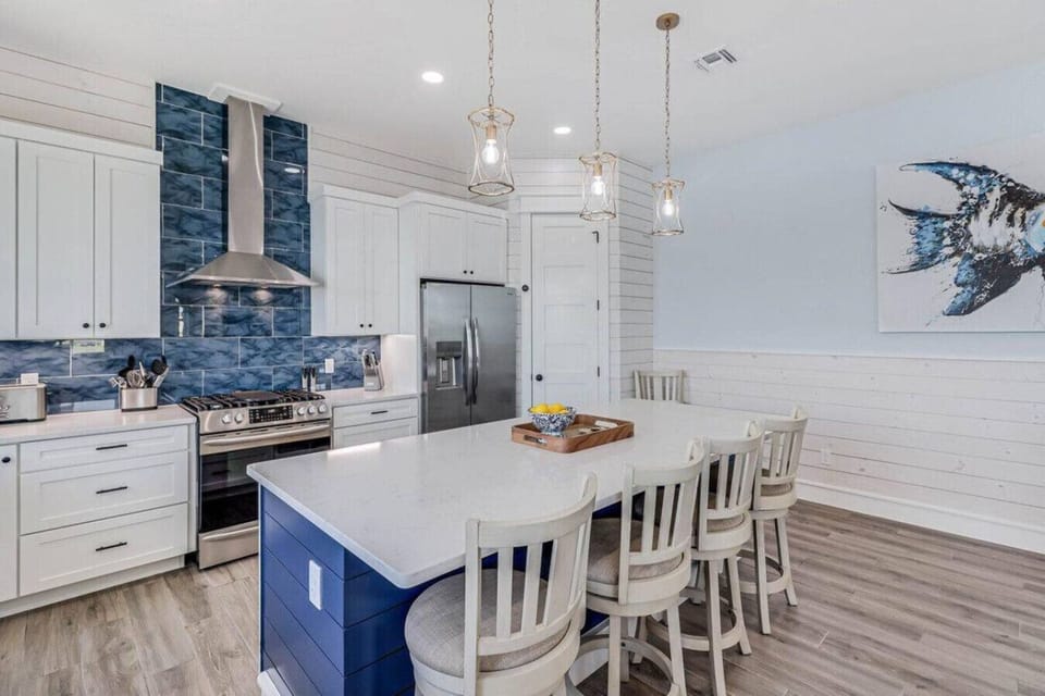 Coastal cooking meets beachy design in this fun and functional kitchen space.