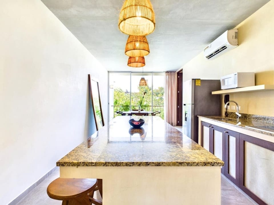 Open kitchen-living layout—ideal for entertaining during your stay.