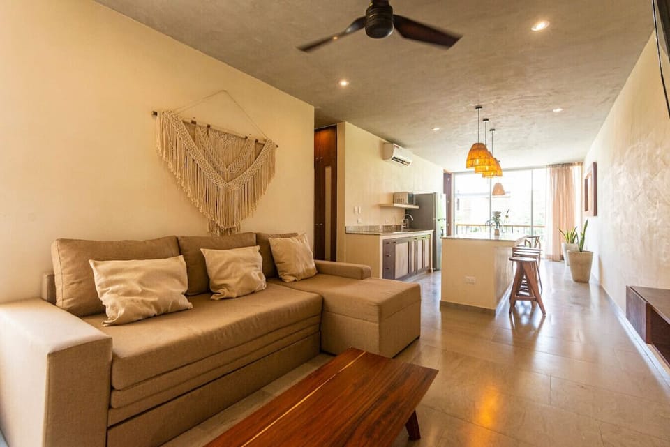 Living room includes a comfy sofa bed that sleeps two extra guests.